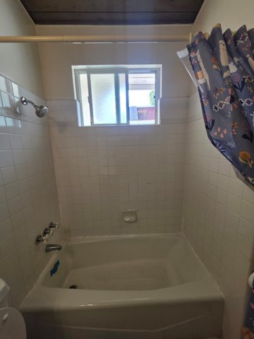 re-caulk the bathtub and seal. $975